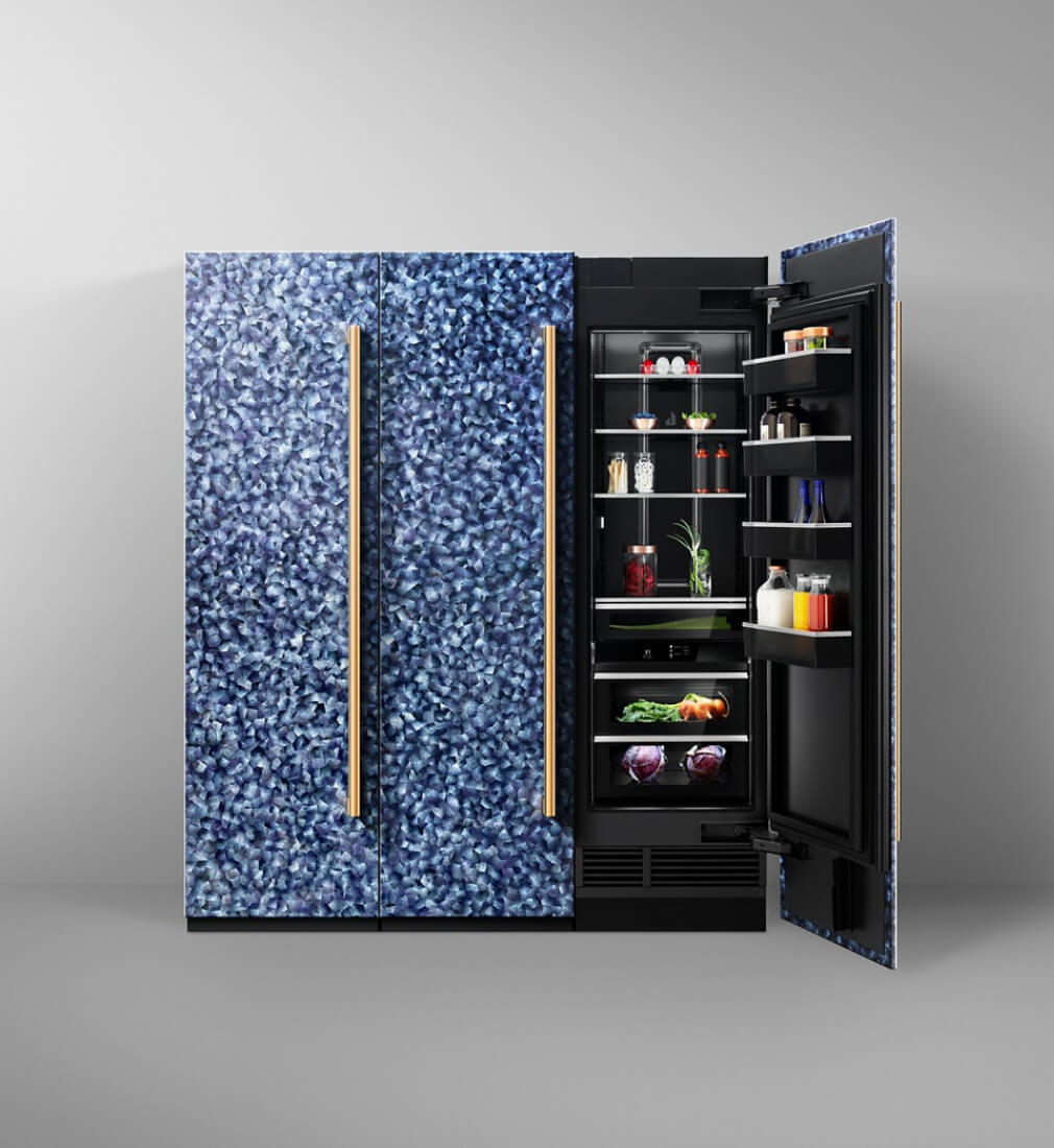 A JennAir® Column Refrigerator with custom panels and organized storage.