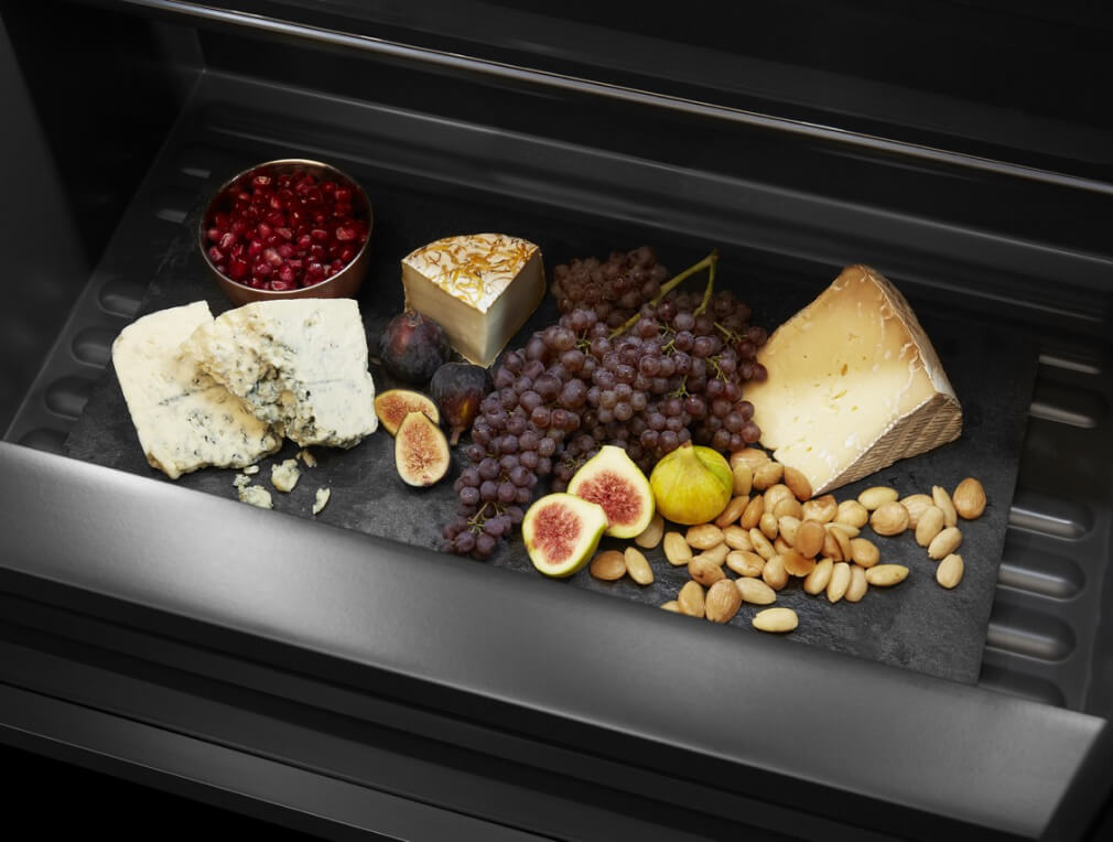 A charcuterie and cheese board ready for serving.