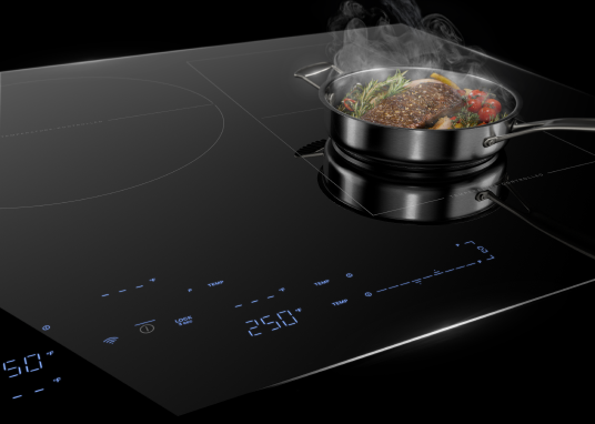 Induction-compatible cookware cooks food on an induction cooktop.