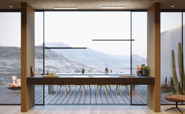 JennAir® NextGen Induction Downdraft Cooktop on a floating kitchen island.