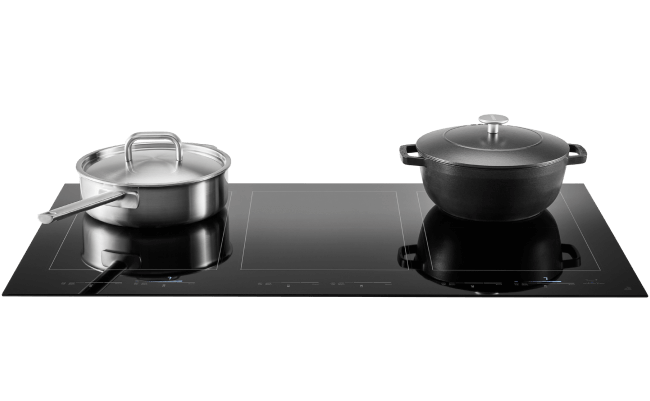 Pots and pans on a JennAir® induction cooking surface