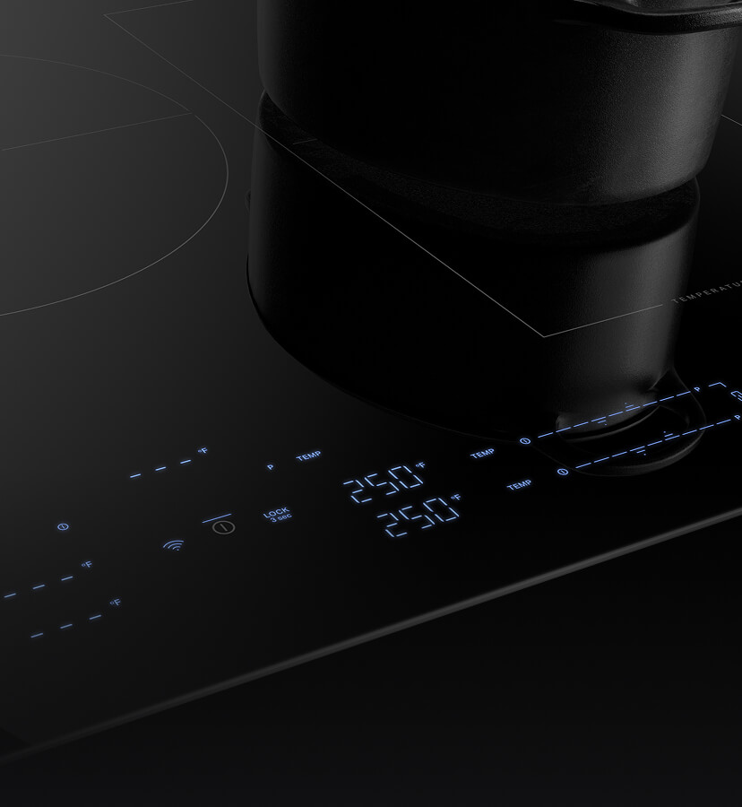 Lit up controls on the new JennAir® Induction Cooktop with Temperature Controlled Cooking. 