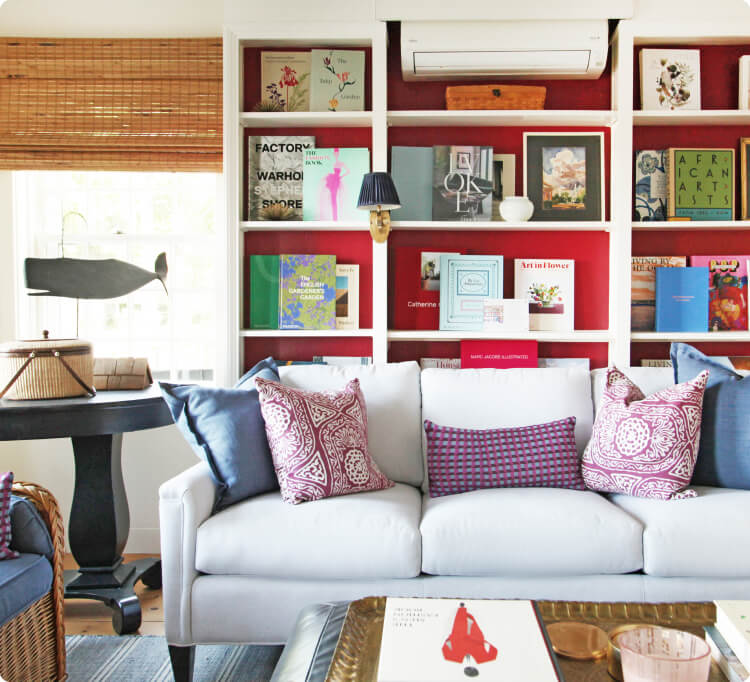 The bookshelves and couches in the reading room. 
