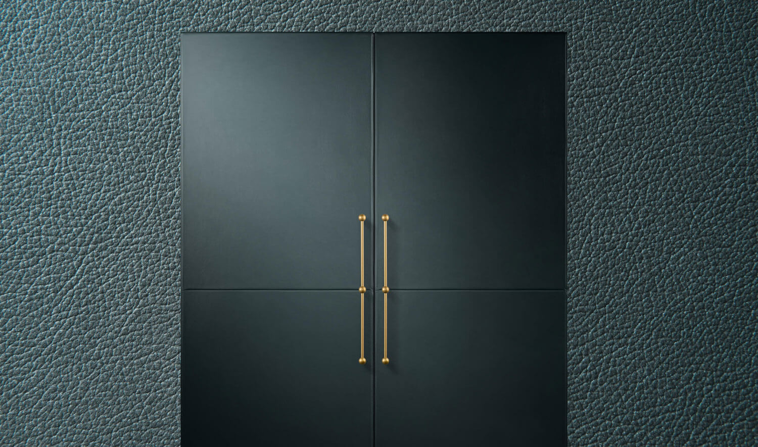 A pair of JennAir® Columns fitted with Mystic Cuts Leather Panels and custom handles on a background of the leather’s texture.