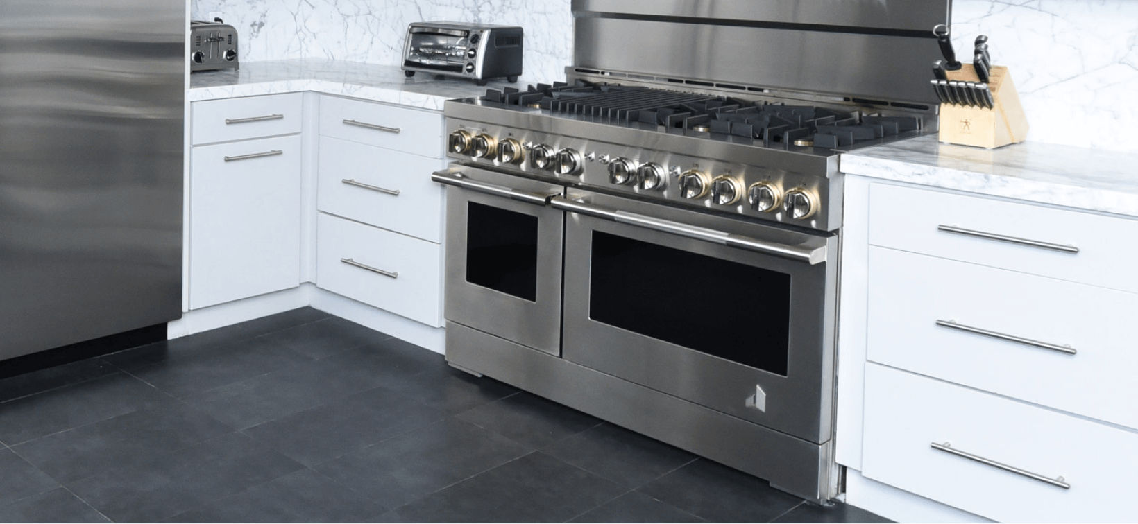 A JennAir Range in a modern white kitchen.