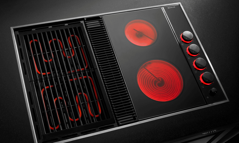 JennAir® electric cooktop with heating elements turned on