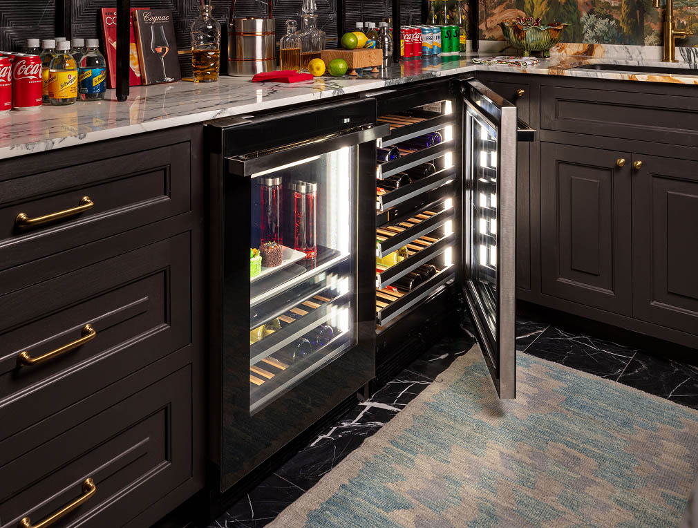 An undercounter wine refrigerator in a modern kitchen