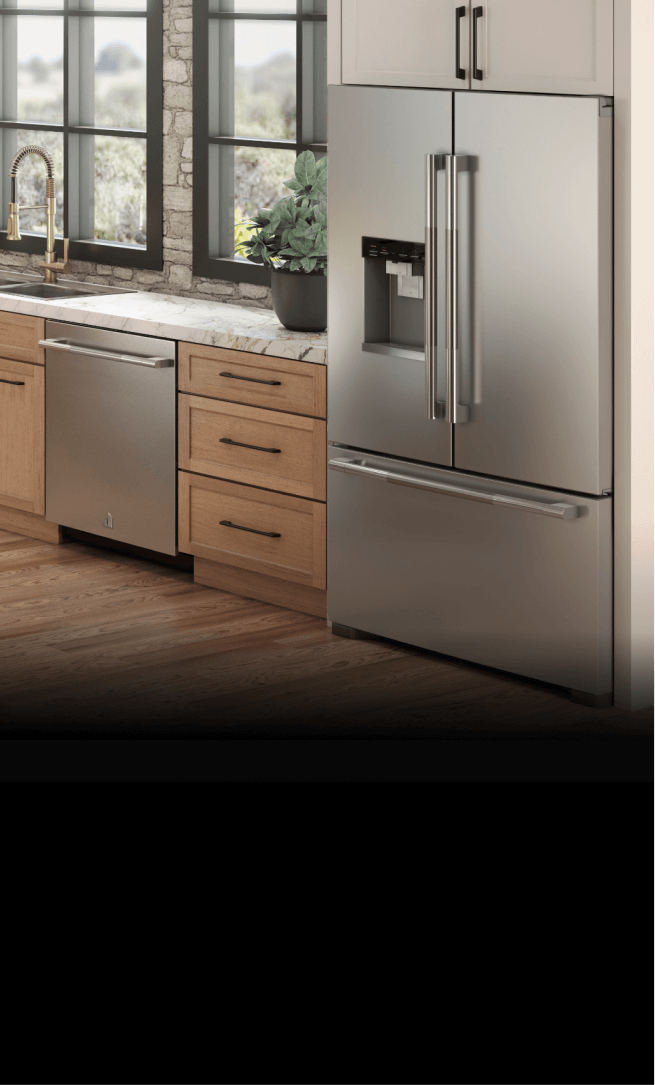 A beautiful, bright kitchen featuring a suite of JennAir® appliances and a RISE™ french door freestanding refrigerator. 