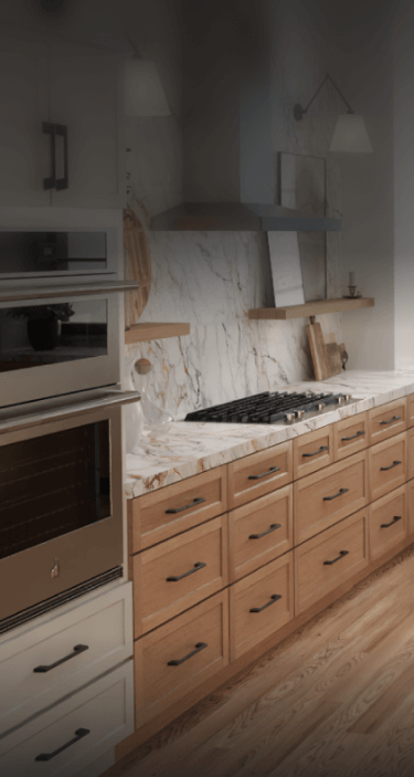 A contemporary kitchen with JennAir® appliances.