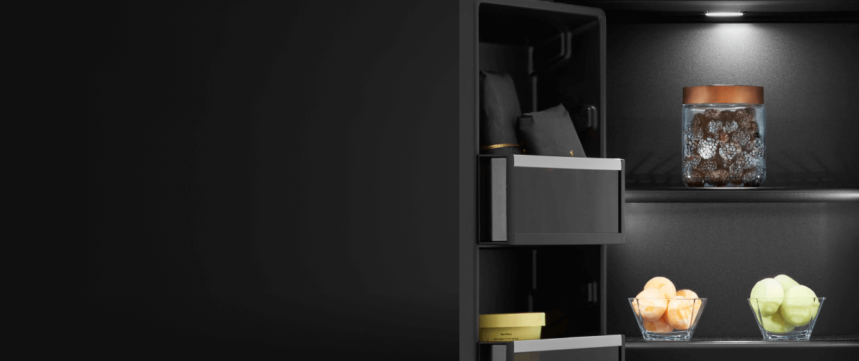 A close up on the shelves and door bins of an Obsidian interior refrigerator.