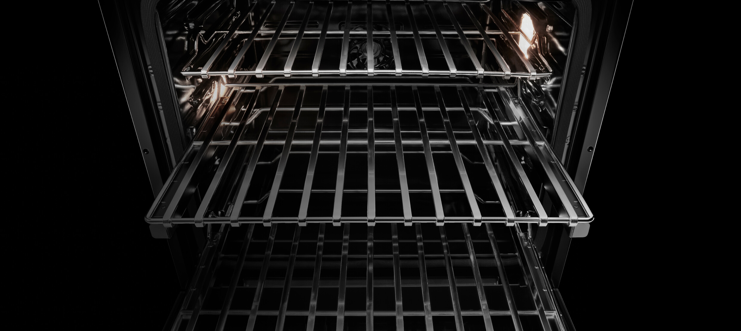 Glide racks inside a wall oven.