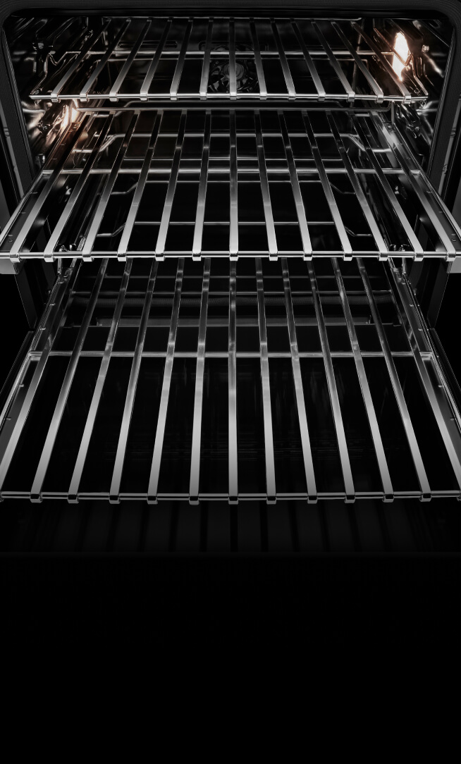 Glide racks inside a wall oven.