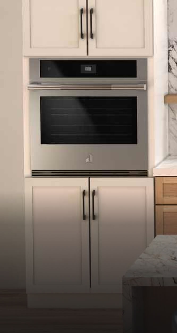 A contemporary kitchen with JennAir® appliances.