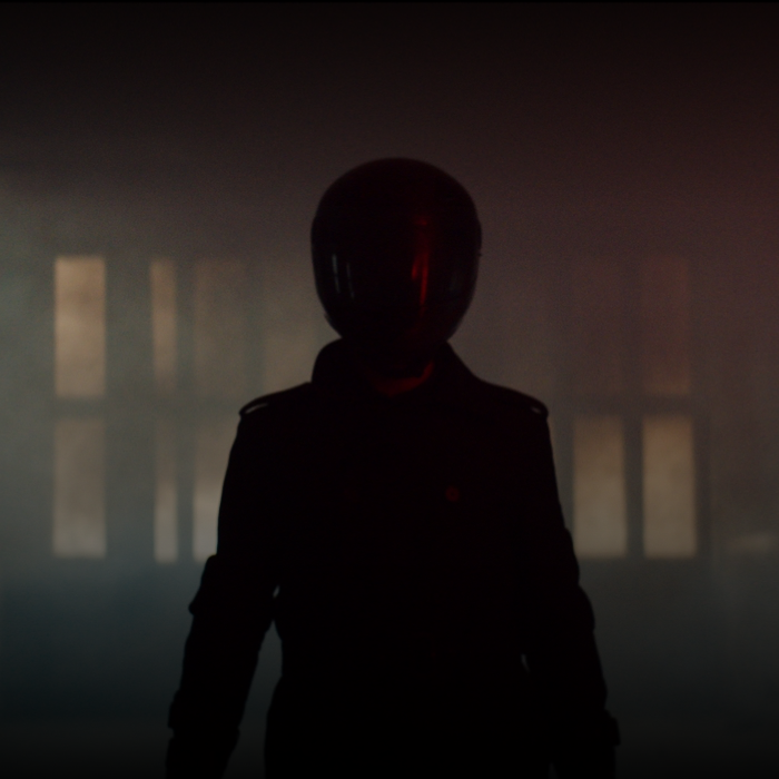 A silhouette of a motorcycle rider. 