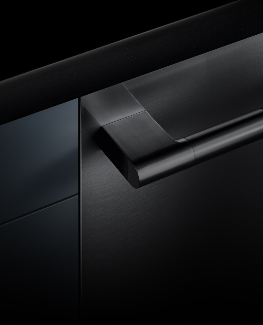The front of a dishwasher, showing the flush and fully integrated design against the cabinetry.