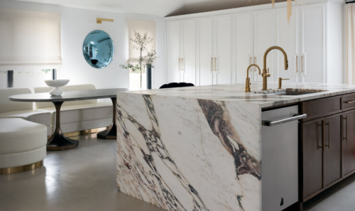 A close up of a white marble contemporary luxury kitchen designed by Nikki Chu.