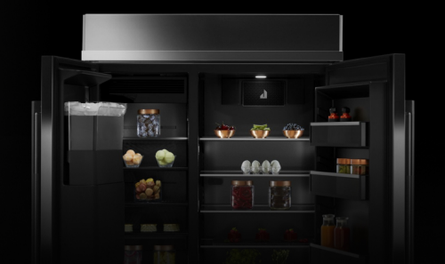 Open French door refrigerator filled with ingredients