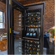 A JennAir® Wine Column stocked with assorted wine
