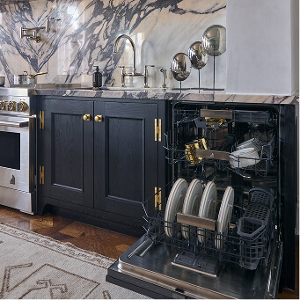 An open JennAir® Dishwasher installed in a kitchen